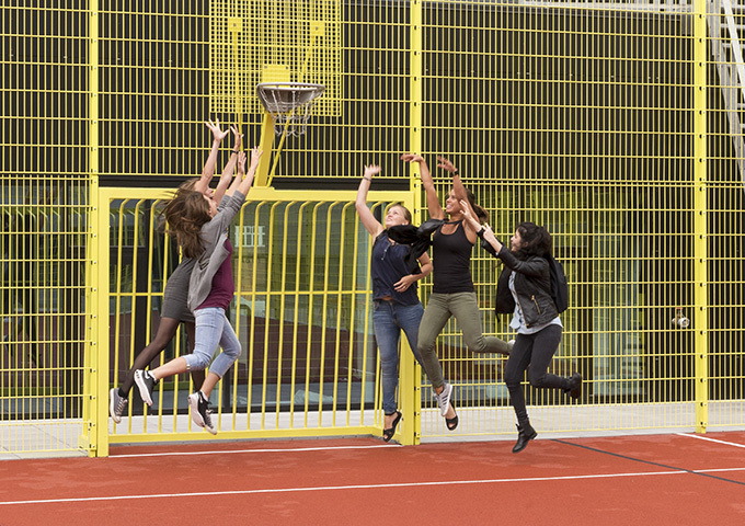 students playing basket ball
