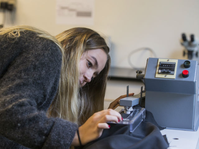 Student working with texture in the lab at VIA Design