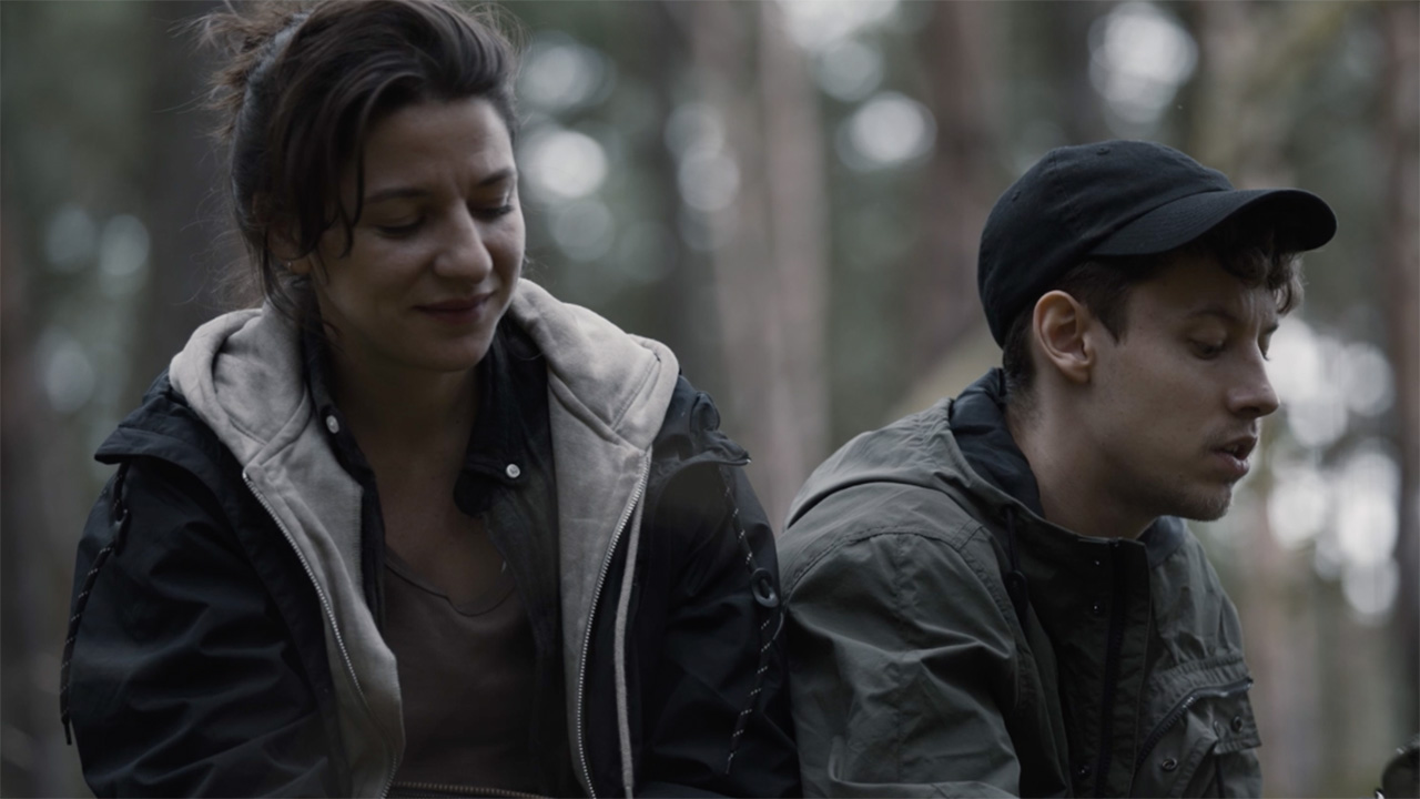 two people in the woods