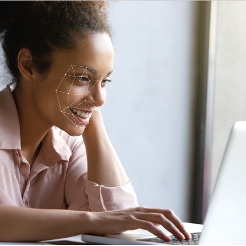 woman looking at computer